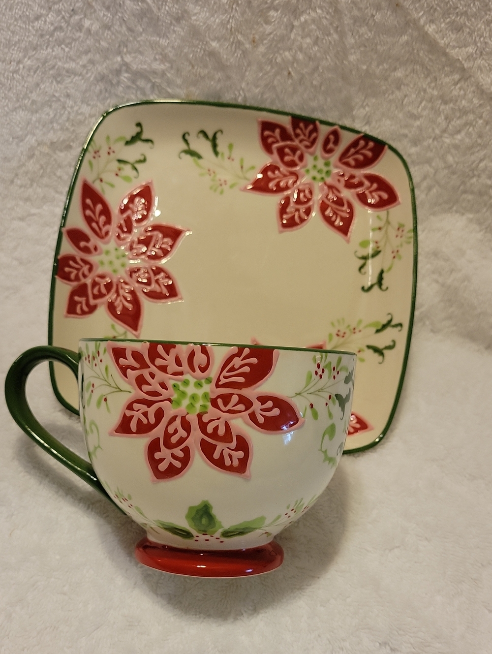 Festive Dutch Wax Red Poinsettia Ceramic Tea Cup and Saucer Set